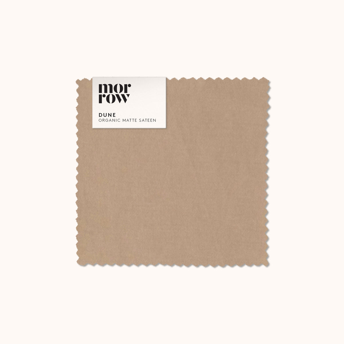 An organic matte sateen Dune fabric swatch with a Morrow label