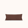 Brown lumbar pillow on a white background